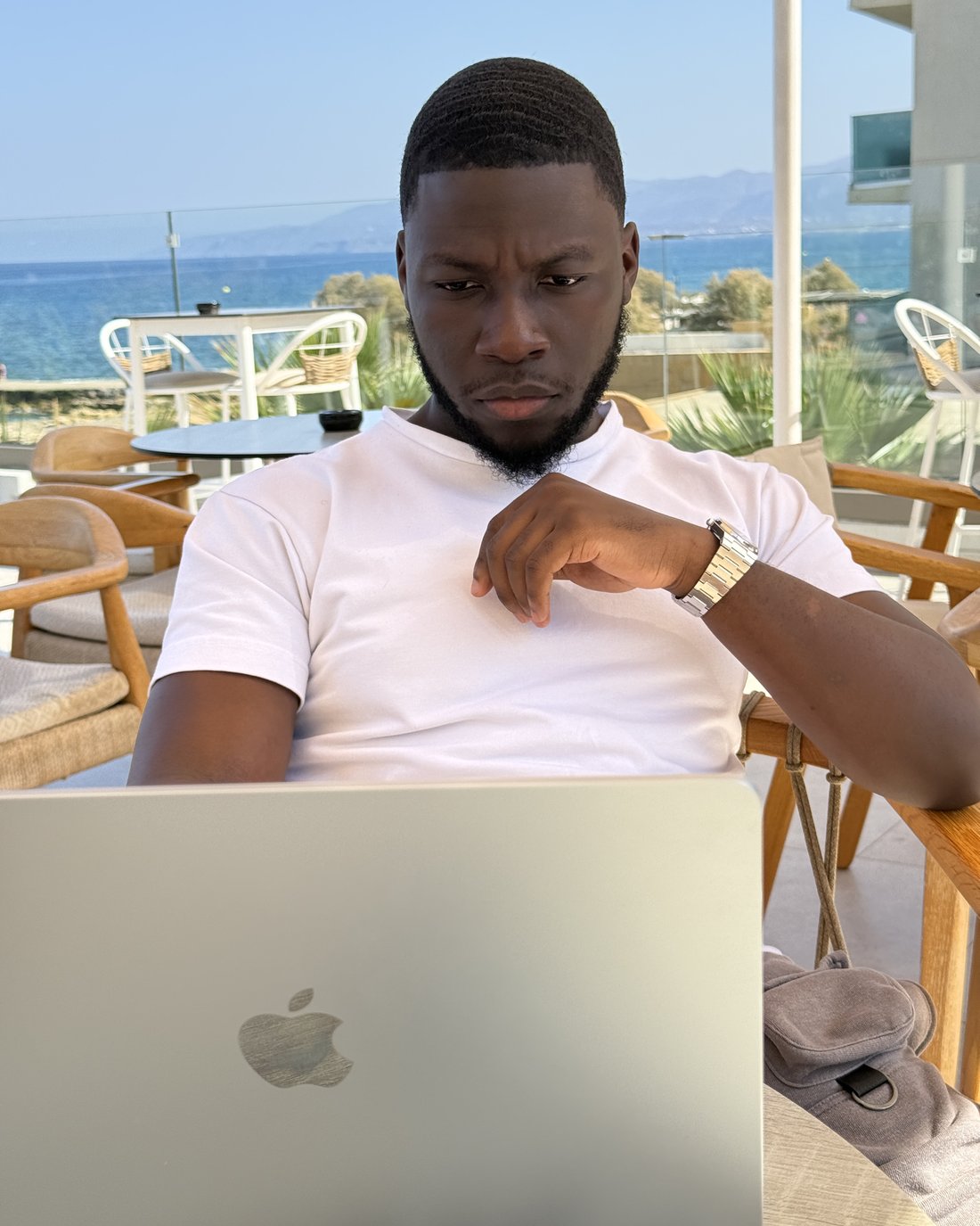 Sully — founder of Sully's Academy, trading at his laptop
